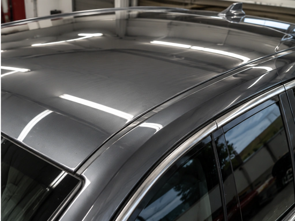 Vehicle panel after hail repair